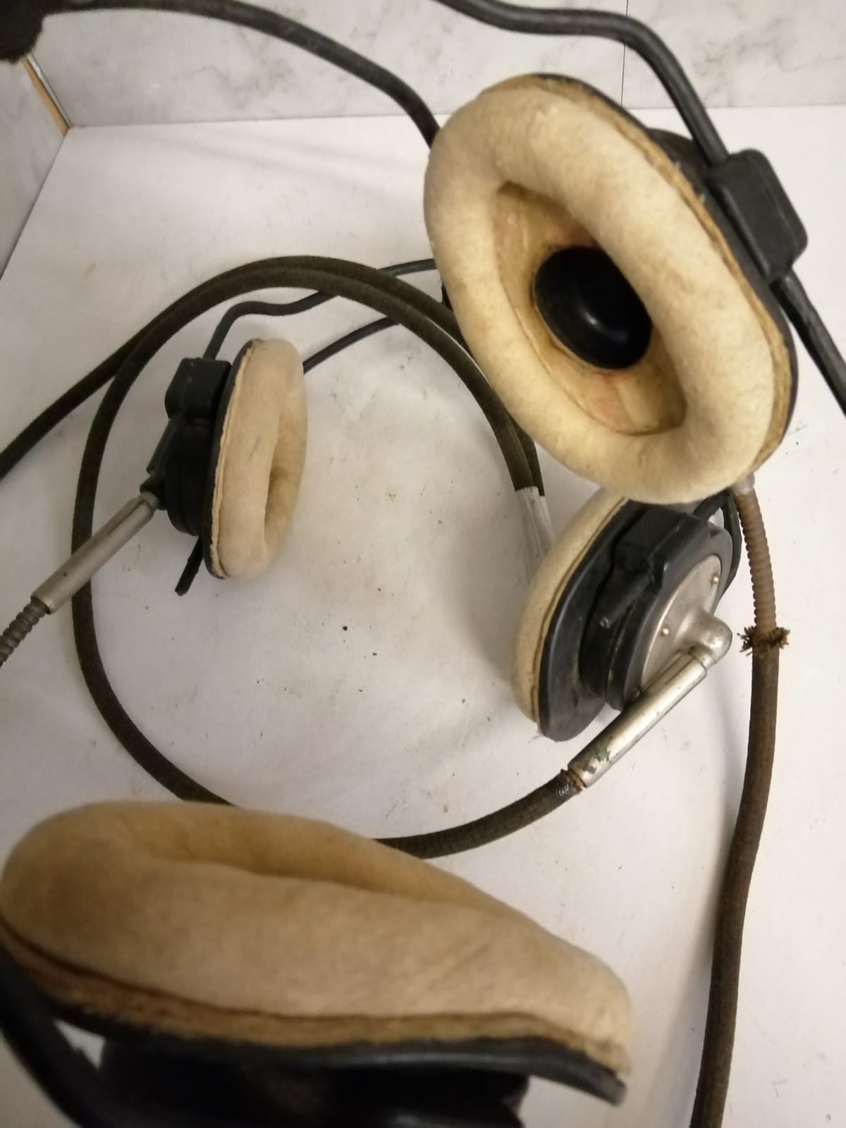 Pair of WW2 piped aircraft working headphones. Vintage